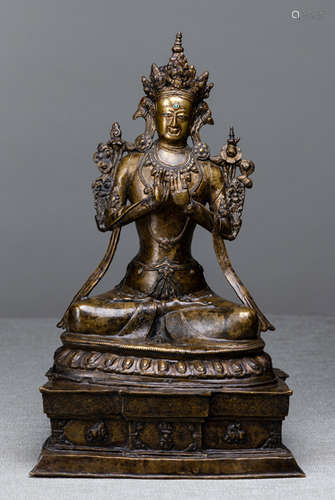 A SILVER-INLAID BRONZE FIGURE OF MAITREYA