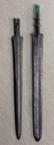 TWO INSCRIBED BRONZE SWORDS