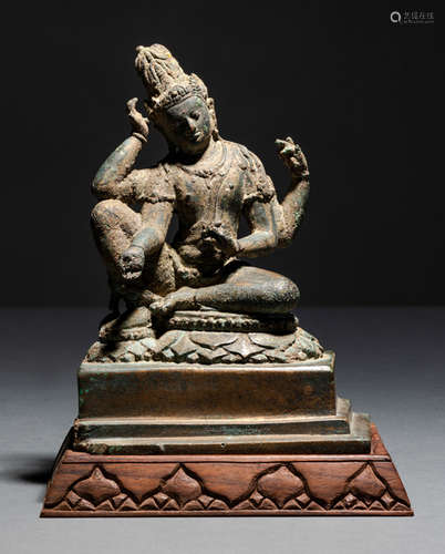 A BRONZE FIGURE OF AVALOKITESHVARA