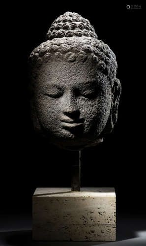 A VOLCANIC STONE HEAD OF BUDDHA SHAKYAMUNI