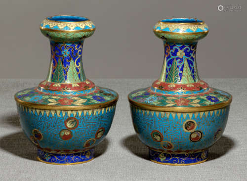 A PAIR OF CLOISONNÉ VASES WITH FLOWER AND BALL DEDCORATION