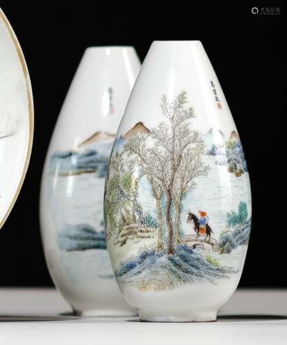 A PAIR OF POLCHROME PAINTED PORCELAIN VASES WITH A SCHOLAR AT A LAKESIDE