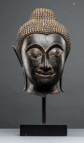 A BRONZE HEAD OF BUDDHA SHAKYAMUNI