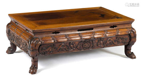 A CARVED HARDWOOD LOW TABLE