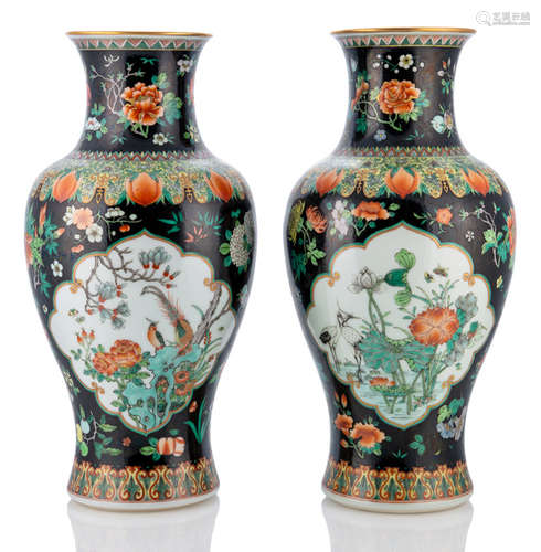 A PAIR OF FAMILLE NOIRE PORCELAIN VASES DEPICTING FLOWERS AND BIRDS IN RESERVES