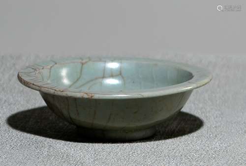 A SMALL CELADON DISH