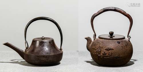 TWO IRON TETSUBIN WITH COVERS DECORATED WITH CHRYSANTHEMUMS AND A RUNNEL WITH BAMBOO DURING FULL MOON