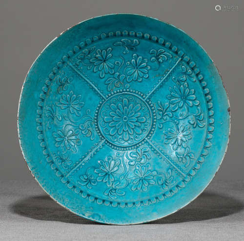 A LARGE TURQUOISE-GLAZED MOLDED POTTERY BOWL