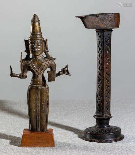 A BRONZE FIGURE OF RAMA AND BRONZE OIL LAMP