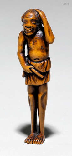 A CARVED WOOD NETSUKE OF STANDING ASHINAGA