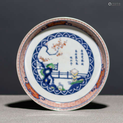 AN ARITA PORCELAIN DISH WITH A POEM AND PLUM TREE