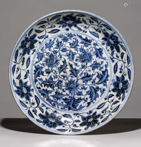 A LARGE BLUE AND WHITE LOTUS AND FLOWER PLATE