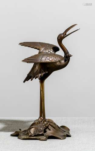 A BRONZE OF A CRANE AND A TORTOISE ON A LOTUS BASE