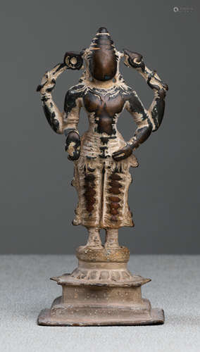 A BRONZE FIGURE OF VISHNU