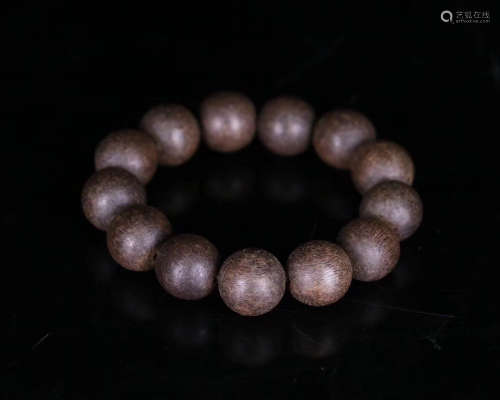 A OLD CHENXIANG WOOD BEADS STRING BRACELET