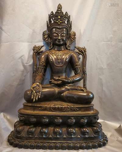 A BRONZE GLITED DALAKE BUDDHA