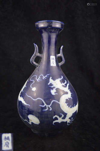 A JI-BLUE GLAZE WHITE DRAGON PATTERN VASE