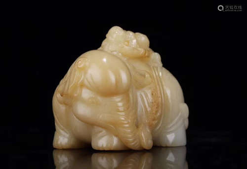 1949-1966, AN ELEPHANT DESIGN SUGAR-COLOR HETIAN JADE ORNAMENT, CHUANGHUI PERIOD