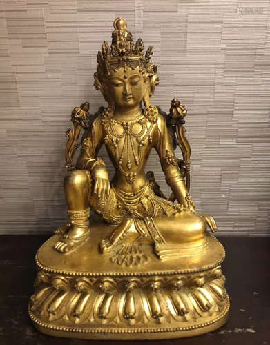 A GILT BRONZE GUANYIN DESIGN FIGURE