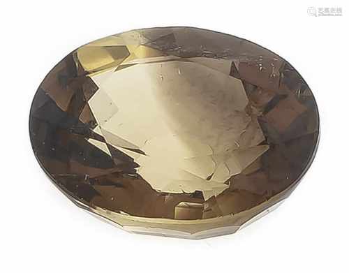 Chrysoberyll 4,32 ct, oval fac., in einem braunstichigen Gelbgrün, kleine innere Merkmale/