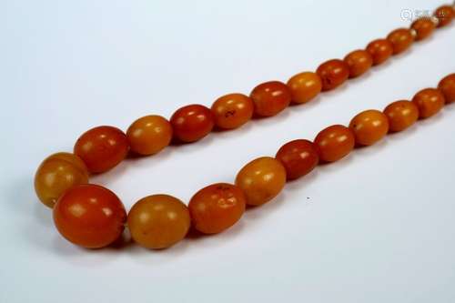 A Small Graduated Amber Bead Necklace