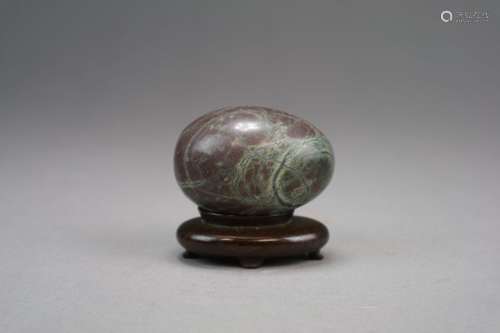 A Chinese polished bloodstone jasper egg and three other hardstone carvings