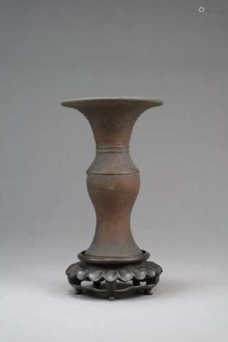 A small Chinese bronze baluster vase, Gu