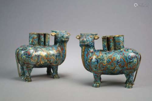 A pair of Chinese cloisonné buffalo vessels