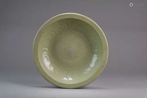 A Chinese Longquan celadon carved and incised dish