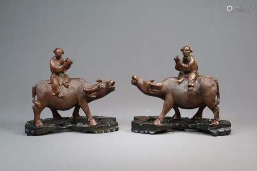 A Pair of Chinese Carved Root Wood Figures of Boys on Buffaloes