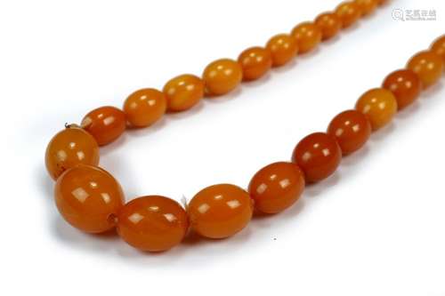 A Graduated Amber Bead Necklace