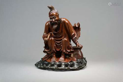 A Chinese Carved Root Wood Figure of a Sage