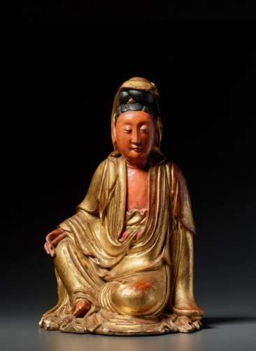 A RARE POLYCHROME CARVED WOOD FIGURE OF 'GUANYIN IN ROY…