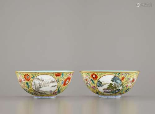 A PAIR OF YELLOW GROUND ENAMELLED 'LANDSCAPE' BOWLS, RE…