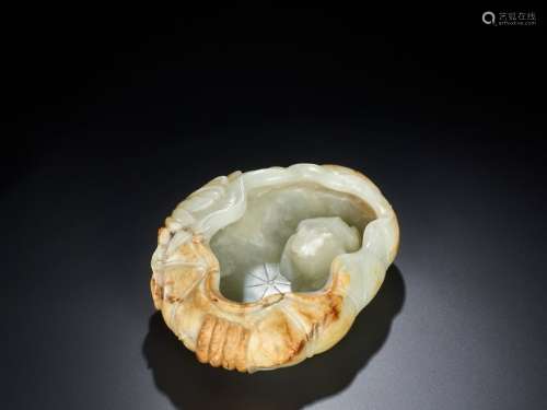 A LARGE 18th CENTURY WHITE AND RUSSET JADE LOTUS LEAF B…