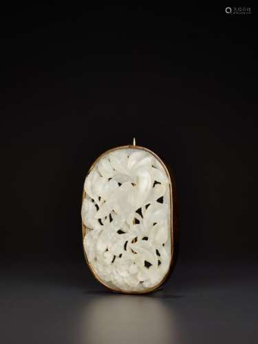 A PALE CELADON JADE OPENWORK PLAQUE, MING DYNASTY