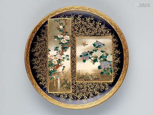 A FINE SATSUMA PLATE BY KINKOZAN WITH BLOSSOMS, BIRDS A…