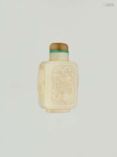 A PALE CELADON ‘CHILONG’ JADE SNUFF BOTTLE, QING DYNAST…