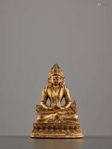 A GOLD LACQUERED TERRACOTTA FIGURE OF BUDDHA AMITAYUS, …
