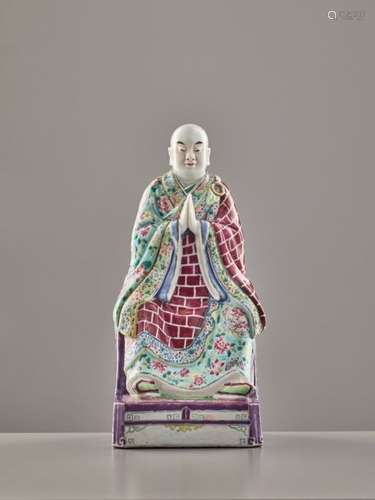 A FAMILLE ROSE FIGURE OF A LUOHAN, LATE 19th CENTURY