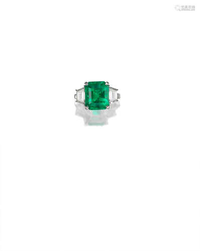 An Emerald and Diamond Ring