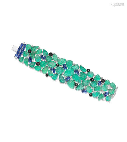 An Emerald, Sapphire, Onyx and Diamond Bracelet
