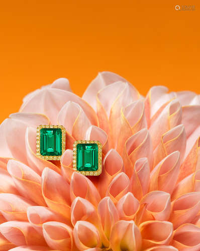 A Fine Pair of Emerald and Coloured Diamond Earrings