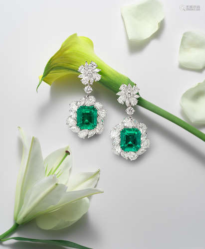 A Fine Pair Of Emerald and Diamond Pendent Earrings