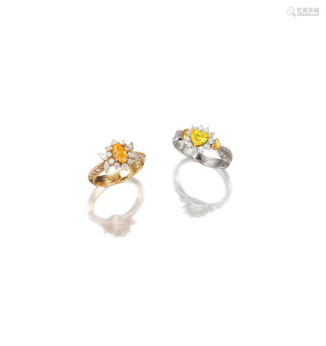 (2) A PAIR OF FANCY COLOURED DIAMOND AND DIAMOND RINGS