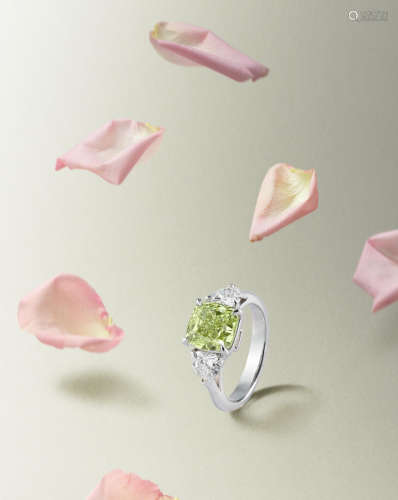 A Fancy Coloured Diamond and Diamond Ring
