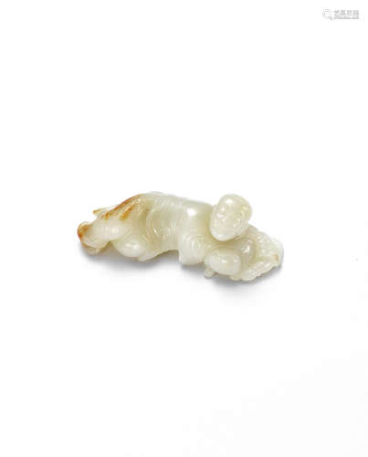 Song/Yuan Dynasty A very rare white and russet jade 'boy and cat' brush rest