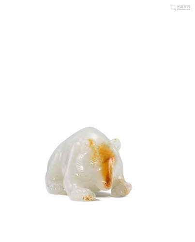 Western Han Dynasty An exceedingly rare and important white and russet jade carving of a bear