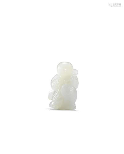 Song Dynasty or later A rare small white jade 'boy riding a carp' group