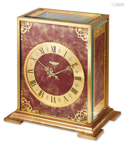 Patek Philippe, A Rare and Early Gilt Brass Mechanical and Solar Powered Table Clock